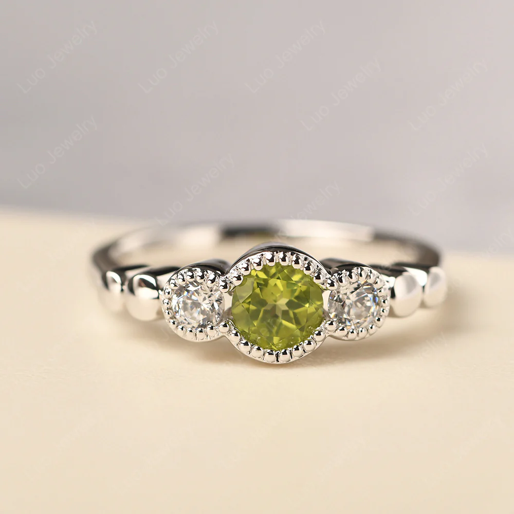3 Stone Bezel Set Peridot Milgrain Ring