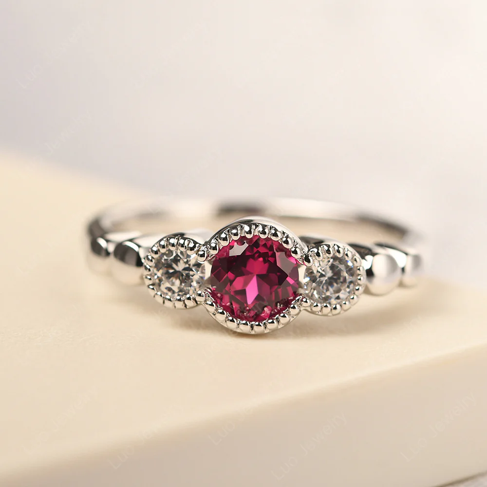 Ruby Three Stone Milgrain Ring
