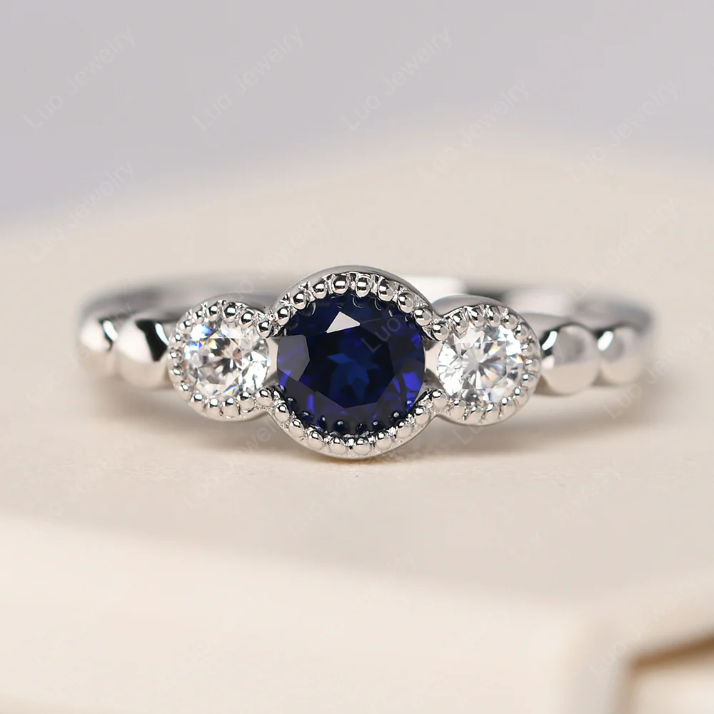 3 Stone Bezel Set Sapphire Milgrain Ring