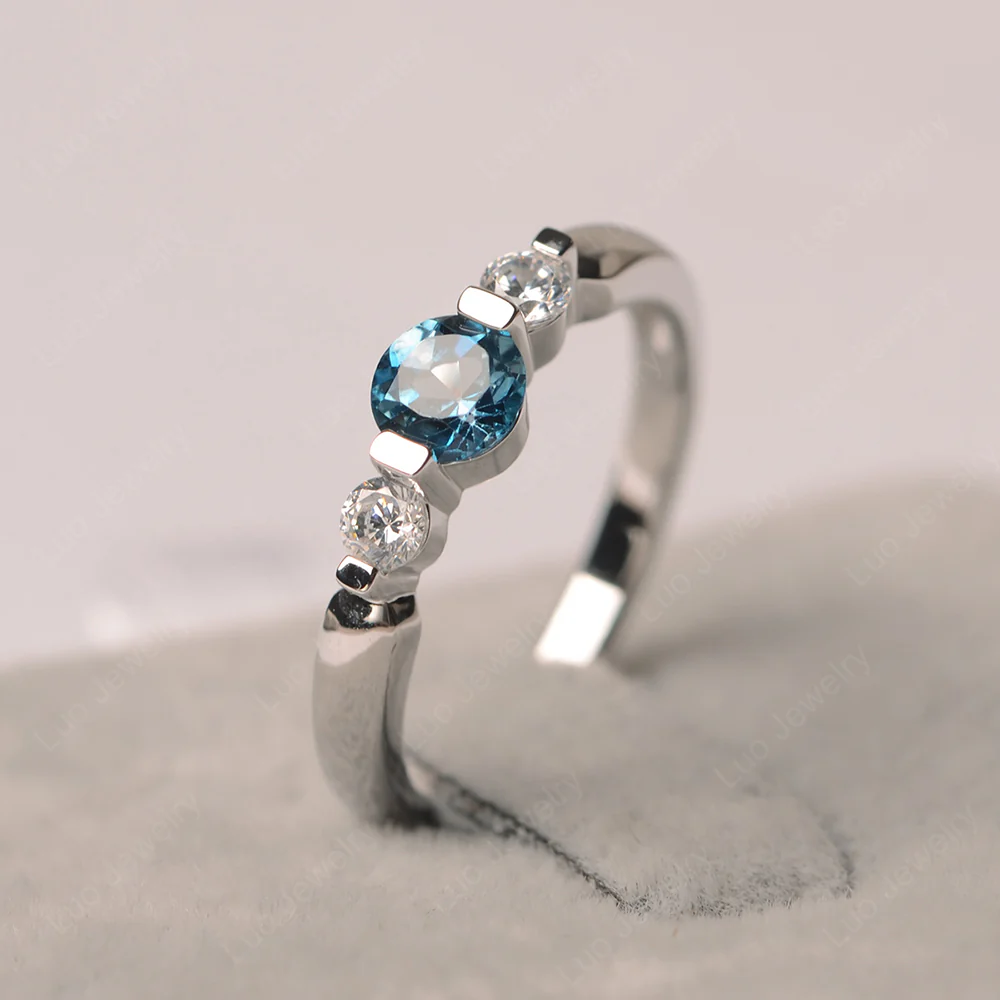 London Blue Topaz Bezel Set Three Stone Ring