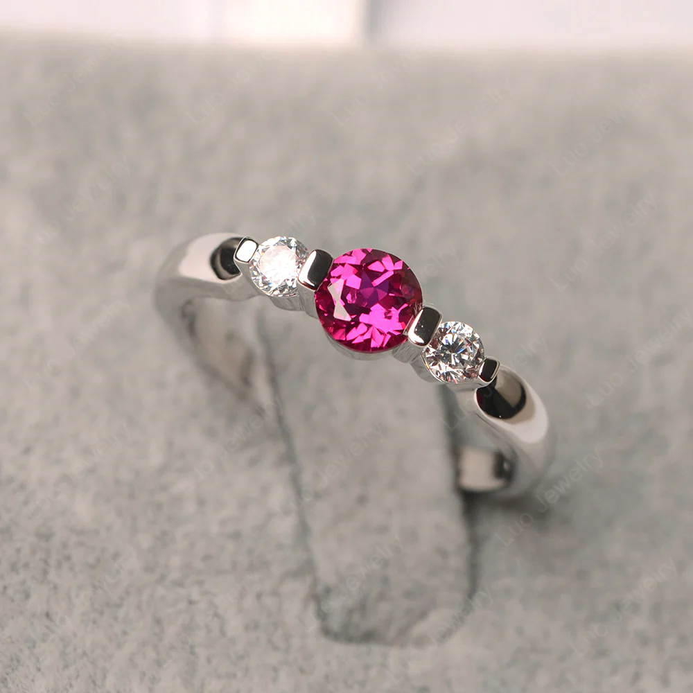 Ruby Bezel Set Three Stone Ring