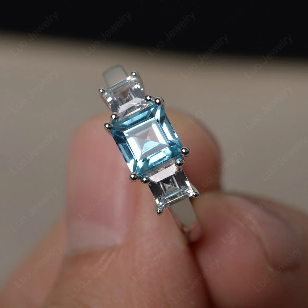 3 Stone Swiss Blue Topaz Ring