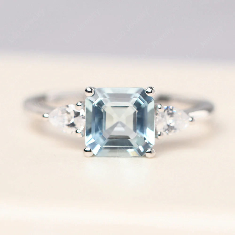 Asscher Aquamarine Ring with Pear Side Stone