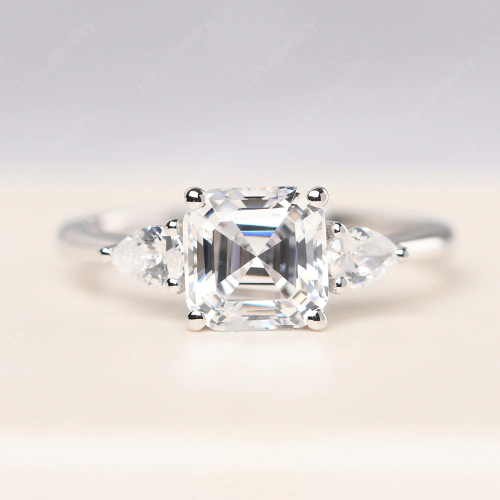 Asscher Cubic Zirconia Ring with Pear Side Stone