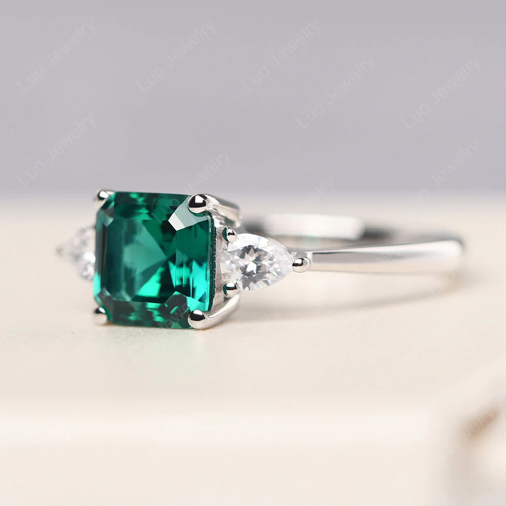 Asscher Emerald Ring with Pear Side Stone - Image 2