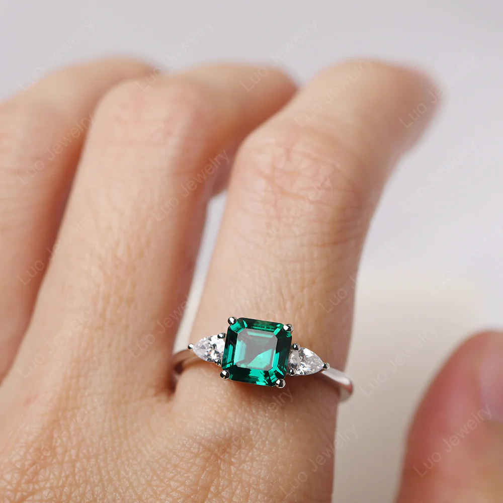 Asscher Emerald Ring with Pear Side Stone - Image 5