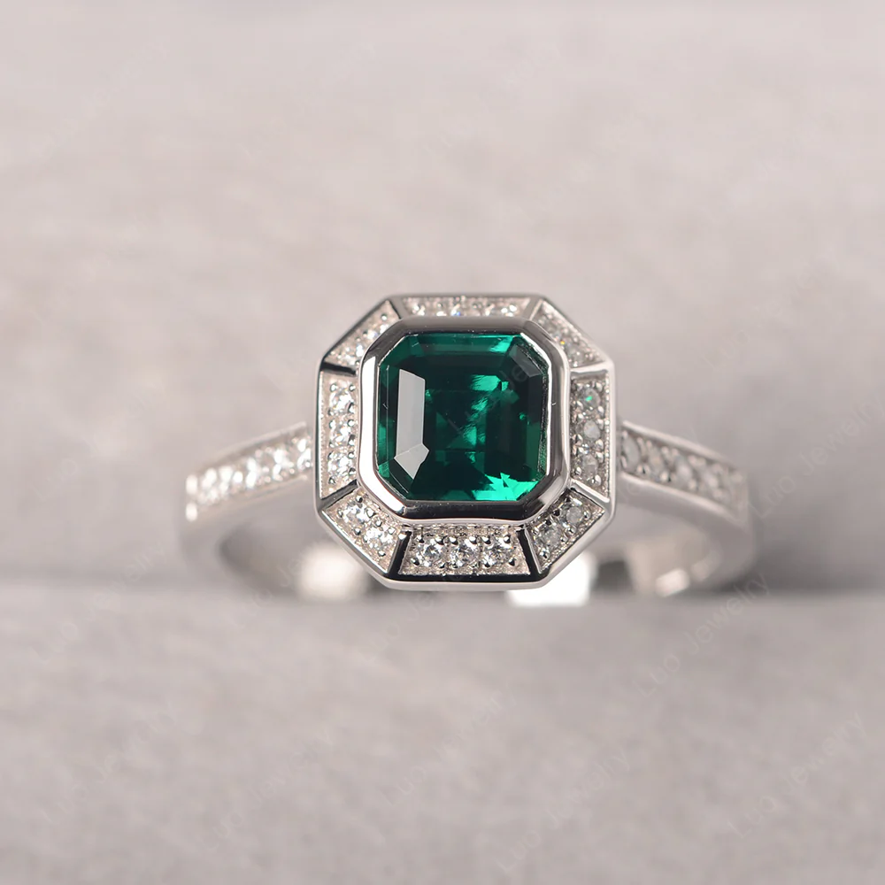 Asscher Cut Emerald Bezel Set Halo Ring