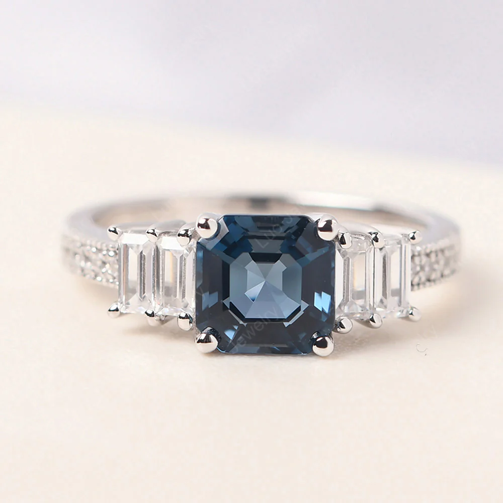 London Blue Topaz Engagement Ring with Baguettes