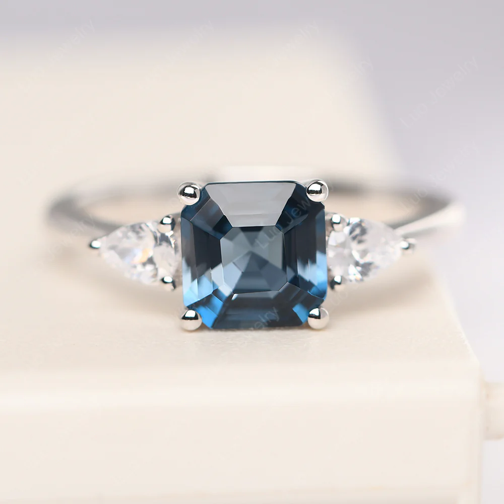 Asscher London Blue Topaz Ring with Pear Side Stone