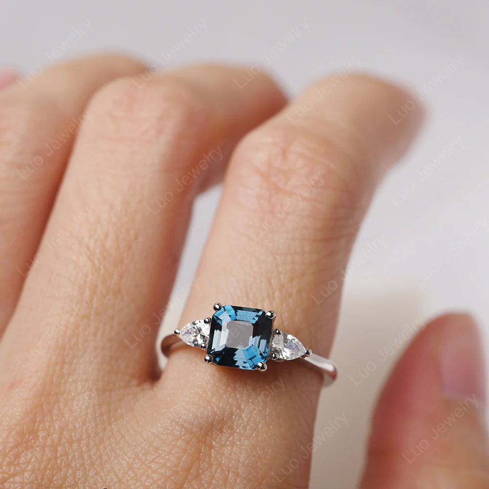 Asscher London Blue Topaz Ring with Pear Side Stone - Image 5