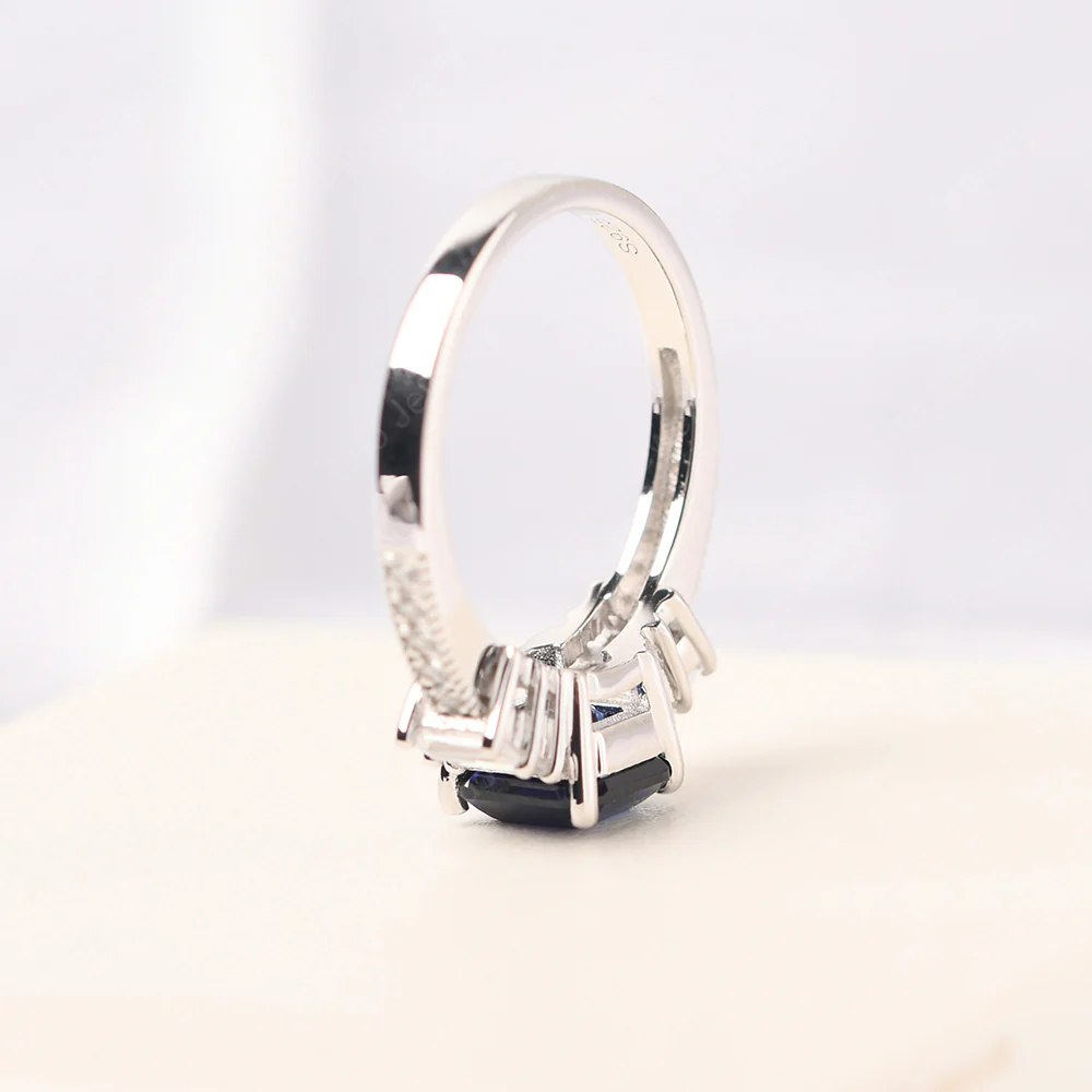 Sapphire Engagement Ring with Baguettes - Image 4
