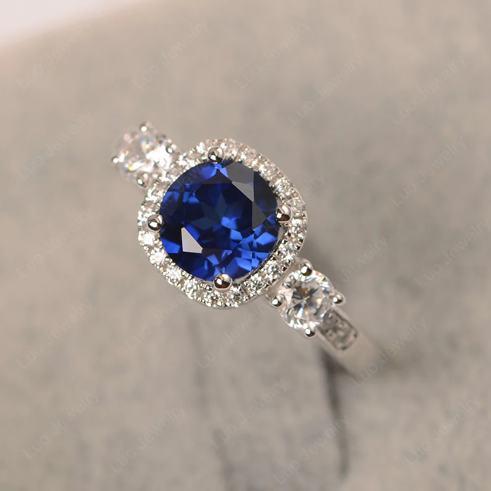 Brilliant Cut Sapphire Halo Engagement Ring