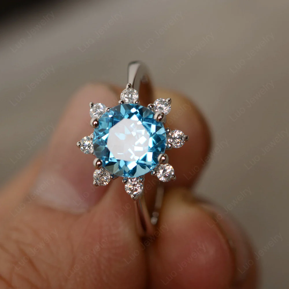 Swiss Blue Topaz Sunburst Halo Engagement Ring