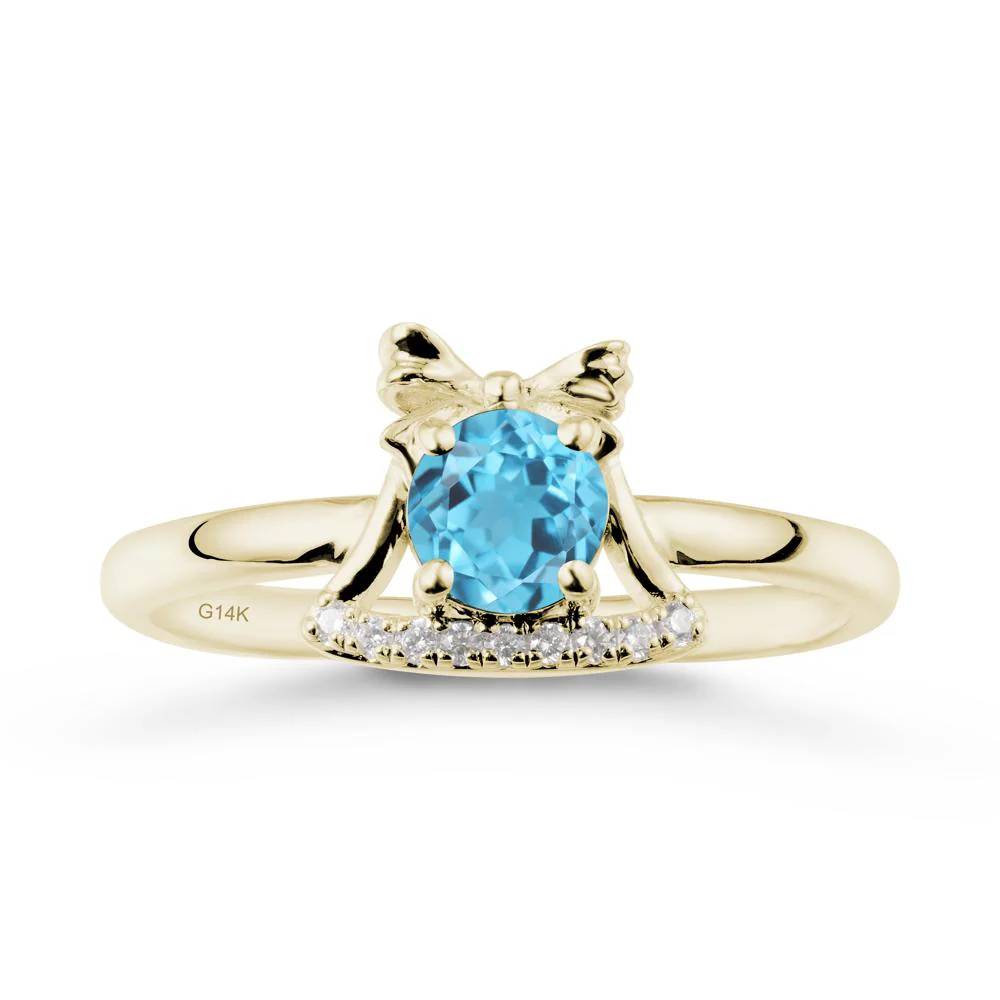 Christmas Swiss Blue Topaz Ring with Jingle Bells Design - Image 3