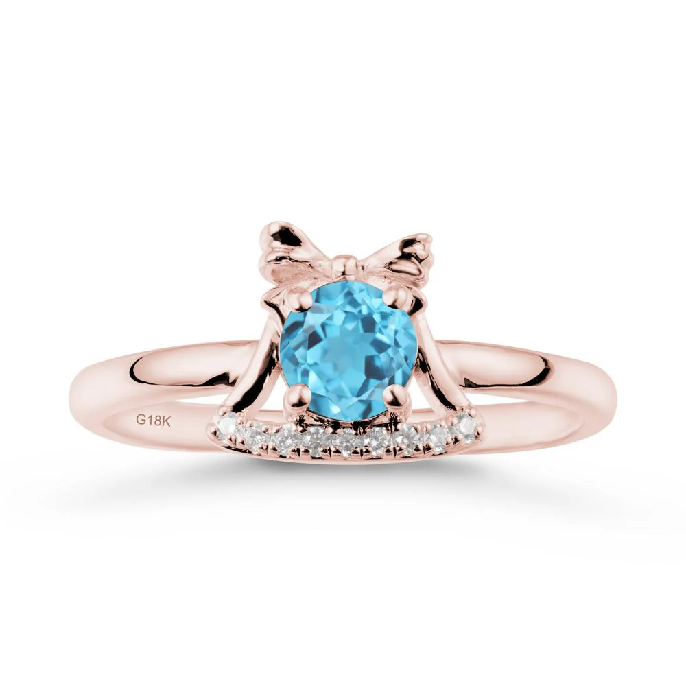 Christmas Swiss Blue Topaz Ring with Jingle Bells Design - Image 4