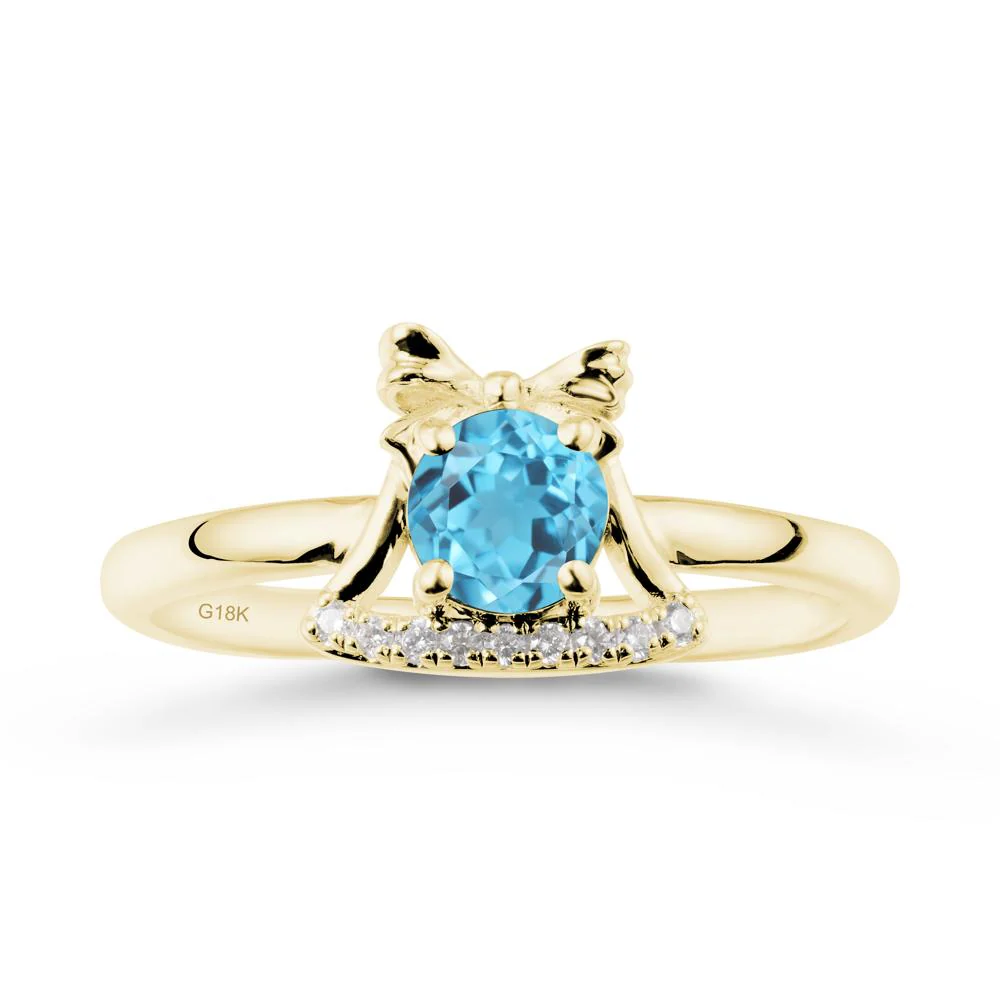 Christmas Swiss Blue Topaz Ring with Jingle Bells Design - Image 6