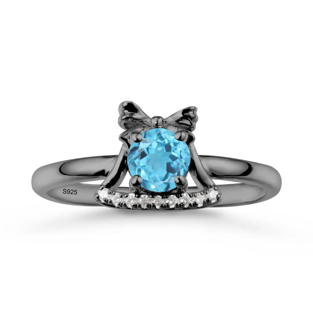 Christmas Swiss Blue Topaz Ring with Jingle Bells Design - Image 7