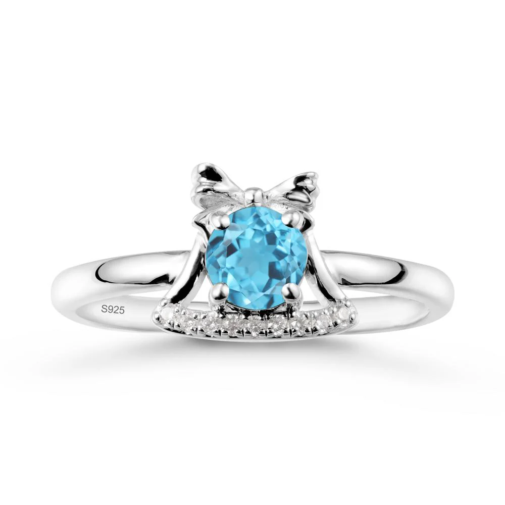Christmas Swiss Blue Topaz Ring with Jingle Bells Design - Image 9