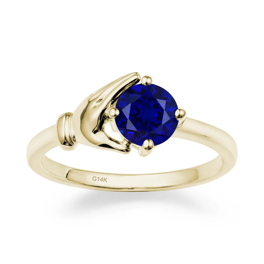 Cupping Hand Round Sapphire Ring