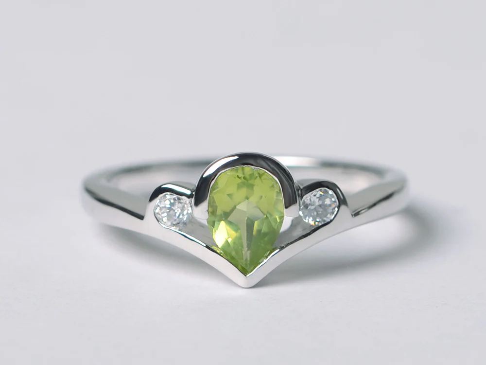 Peridot Three Stone Bezel Ring