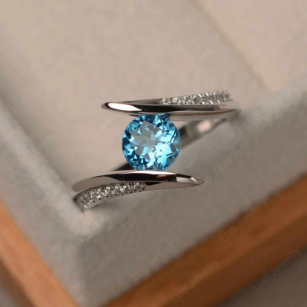 Tension Set Swiss Blue Topaz Ring