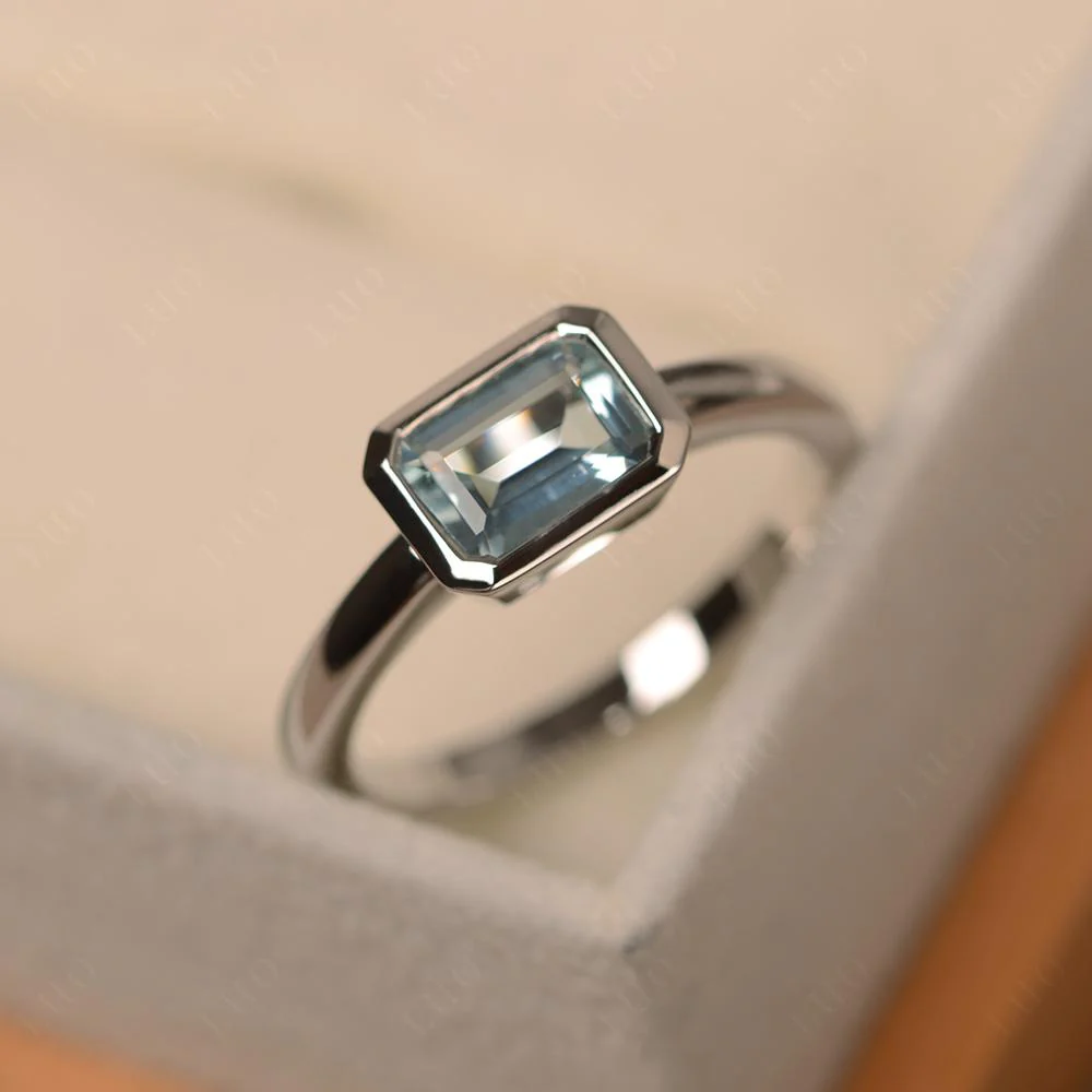 East West Emerald Cut Aquamarine Bezel Ring - Image 31
