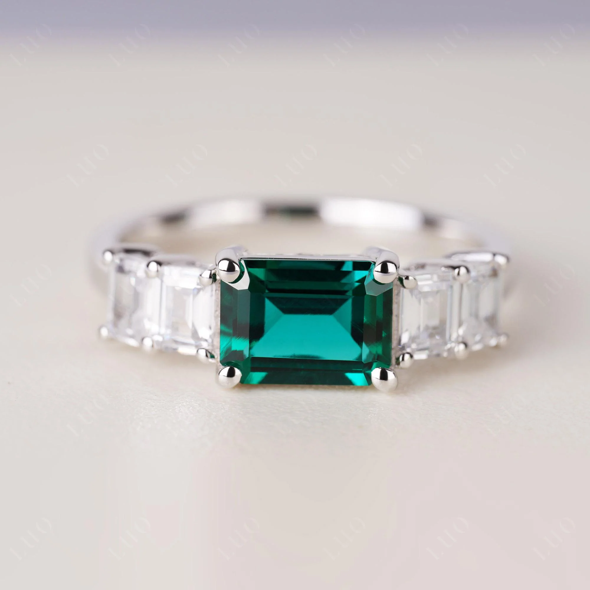 East West Emerald Cut Emerald Ring