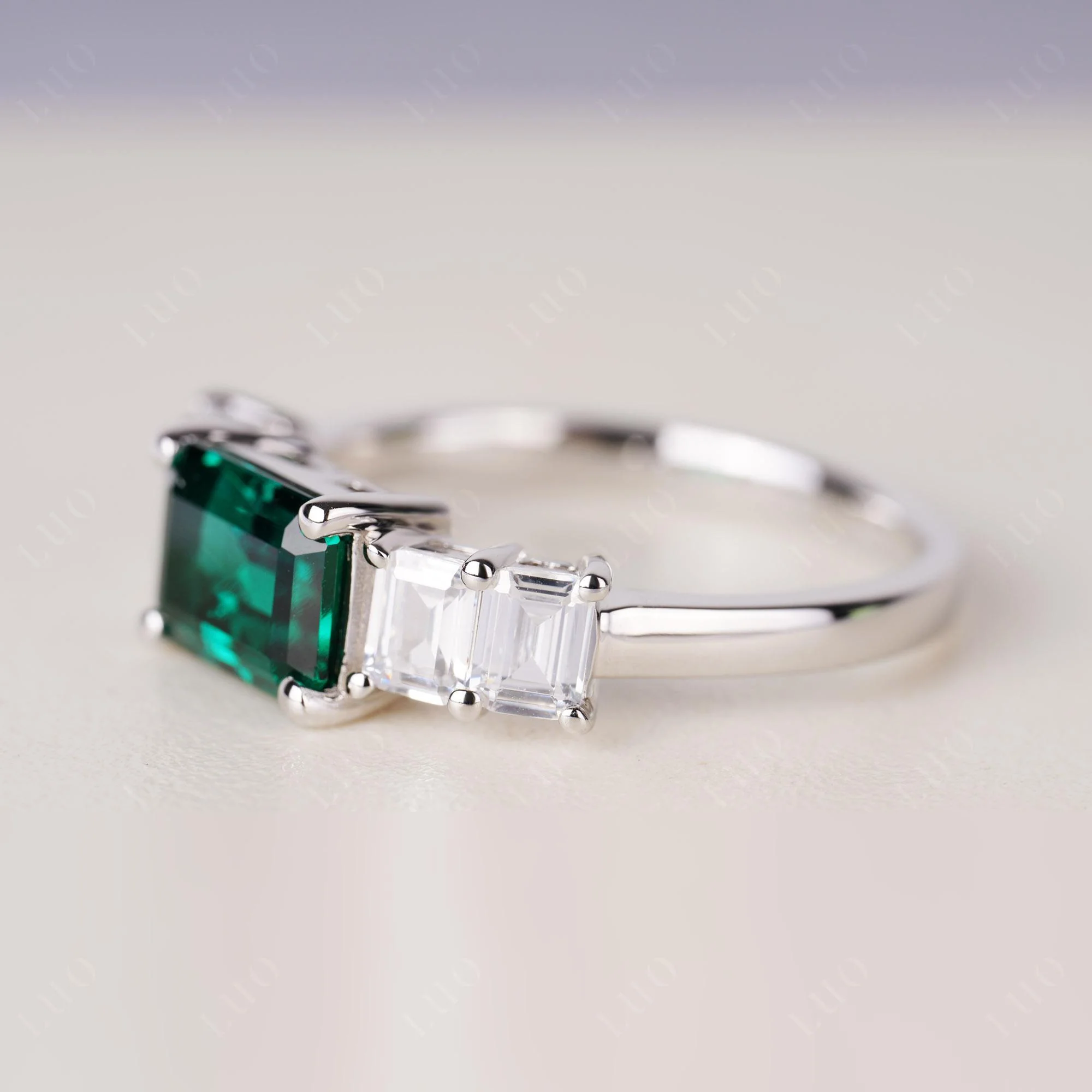 East West Emerald Cut Emerald Ring - Image 2