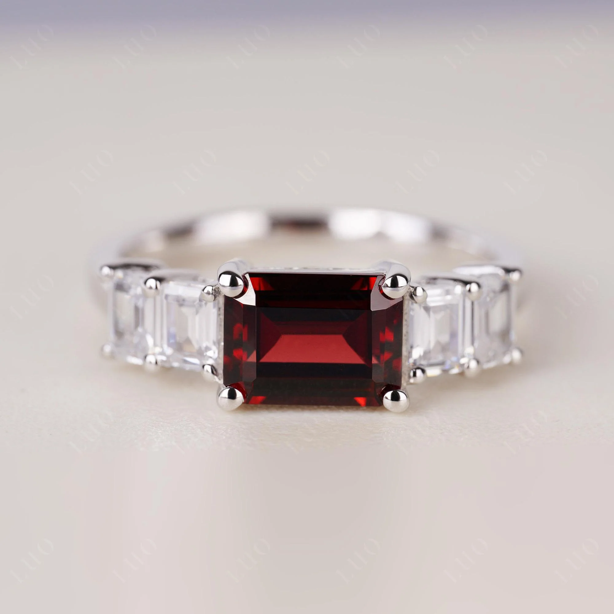 East West Emerald Cut Garnet Ring