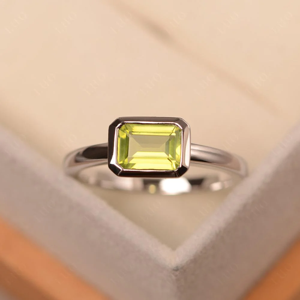 Peridot Bezel Emerald Cut Engagement Ring - Image 29