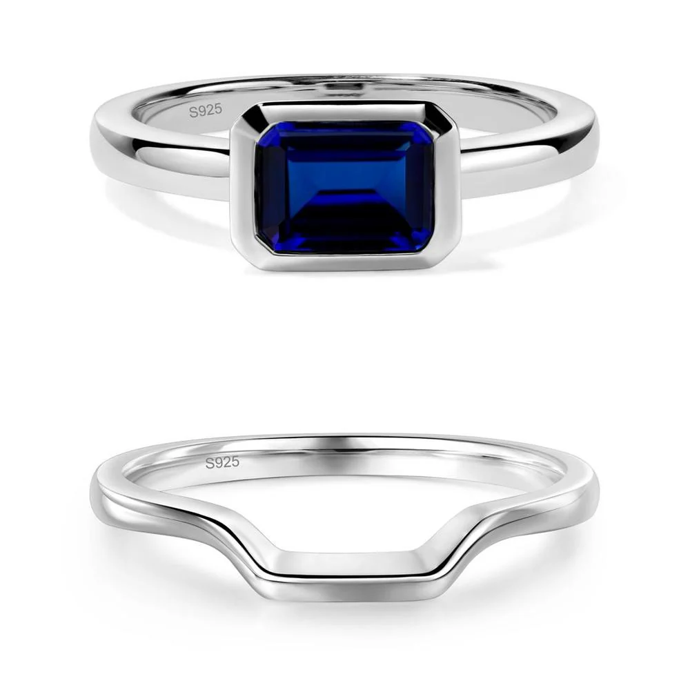East West Emerald Cut Sapphire Bezel Ring - Image 23