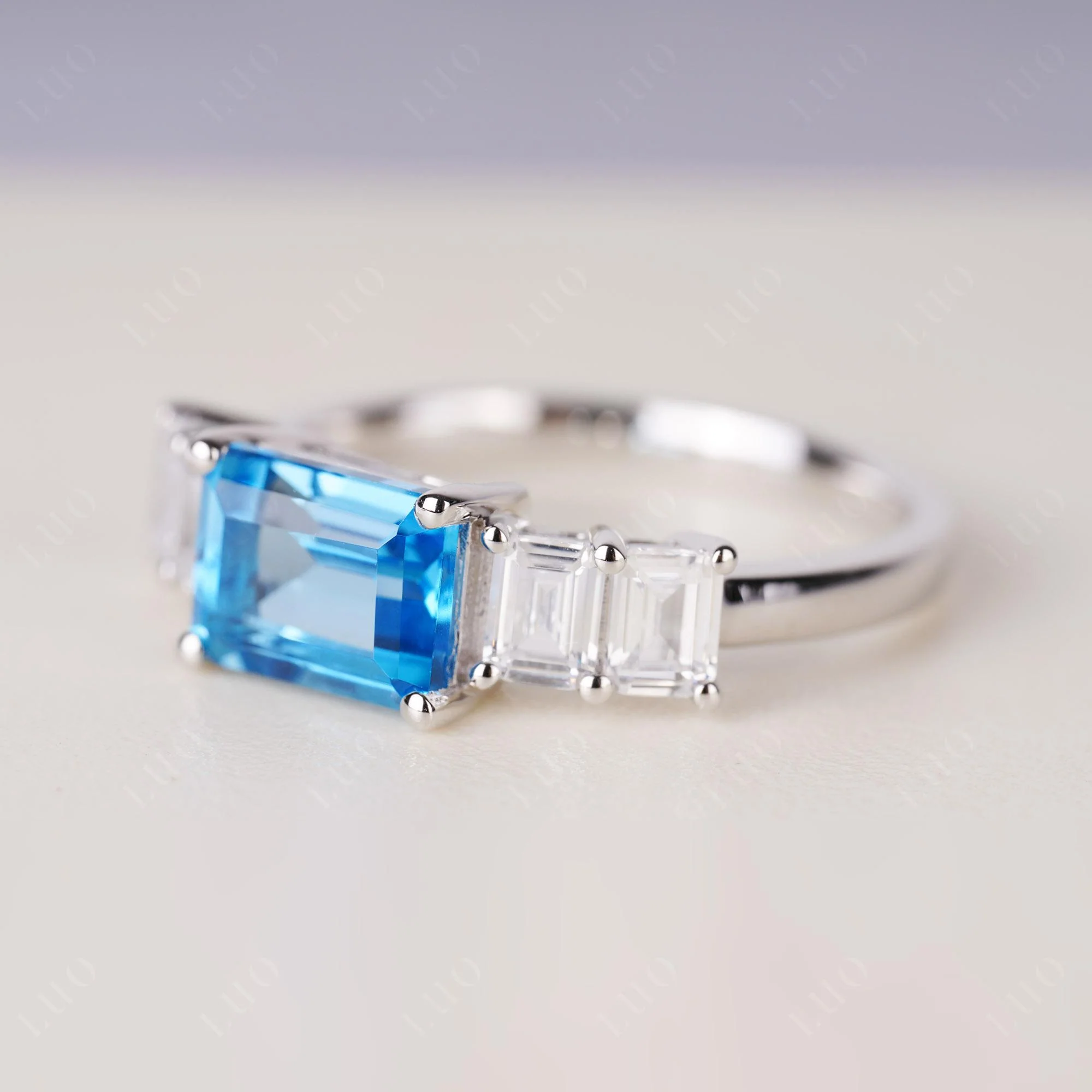 East West Emerald Cut Swiss Blue Topaz Ring - Image 2
