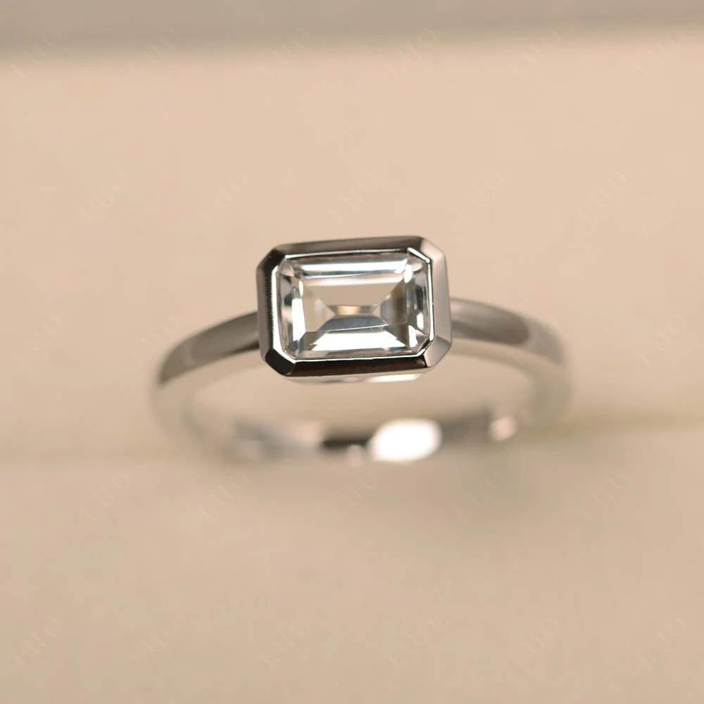 White Topaz Bezel Emerald Cut Engagement Ring - Image 30