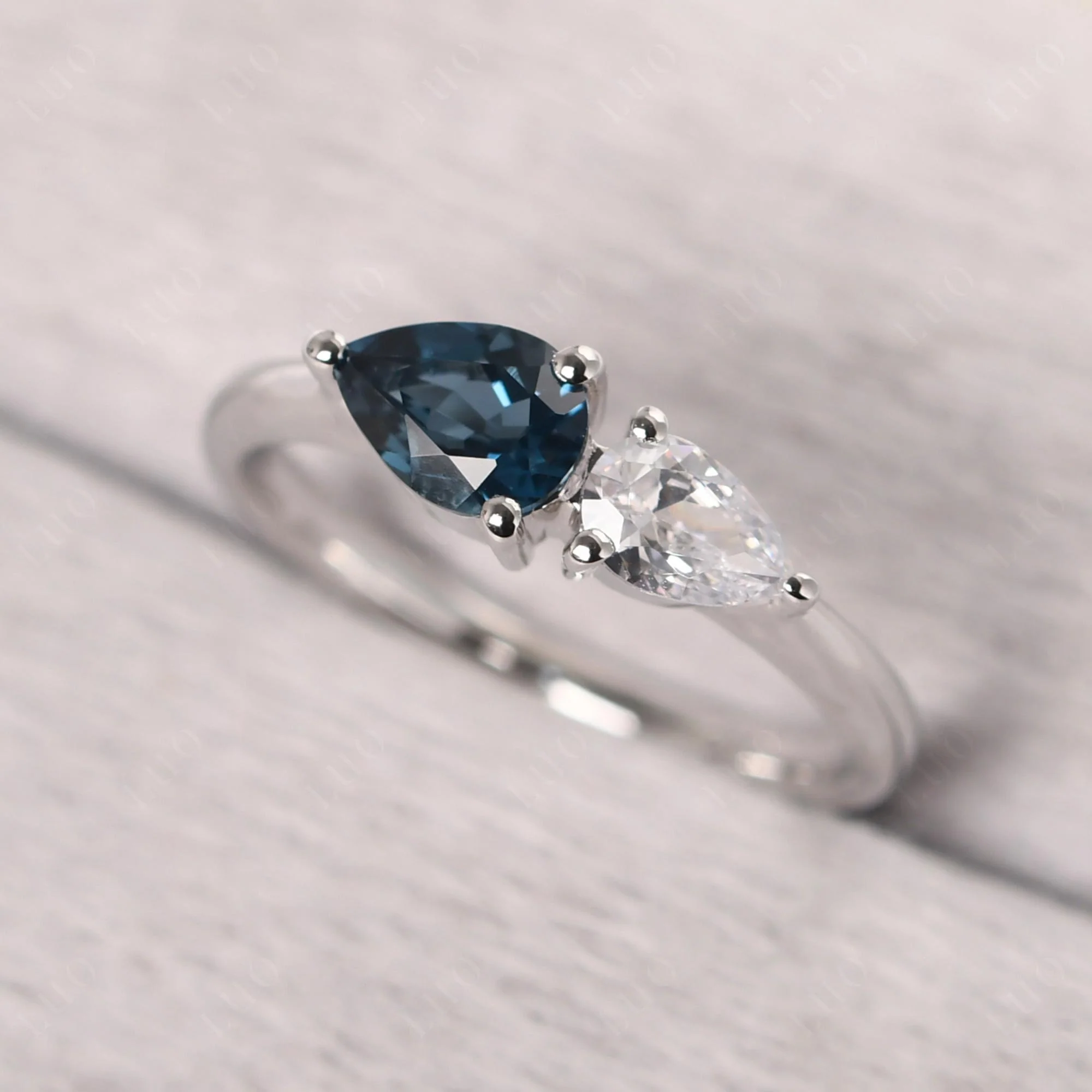 East West Pear Cubic Zirconia and London Blue Topaz Ring - Image 10