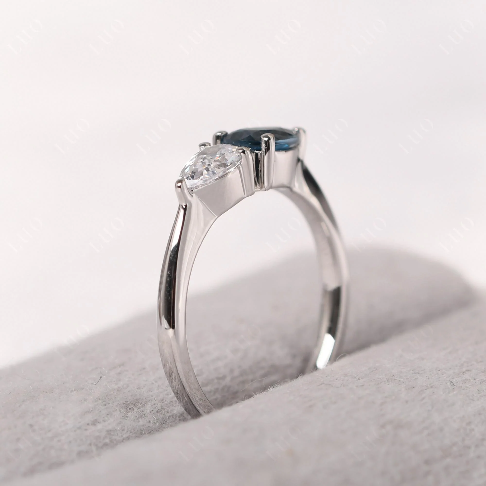East West Pear Cubic Zirconia and London Blue Topaz Ring - Image 13