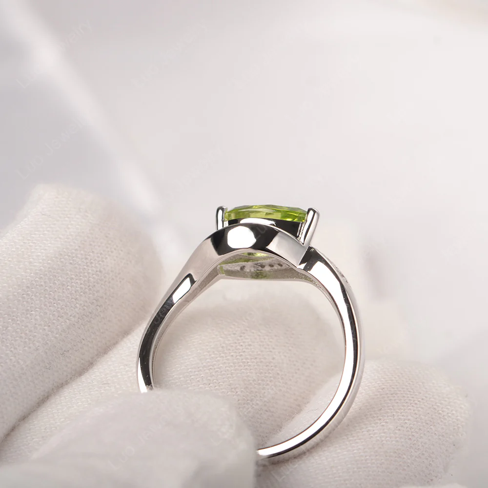 East West Pear Peridot Engagement Ring - Image 4