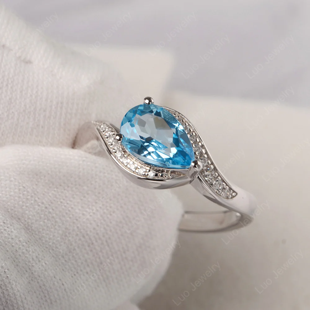 East West Pear Swiss Blue Topaz Engagement Ring