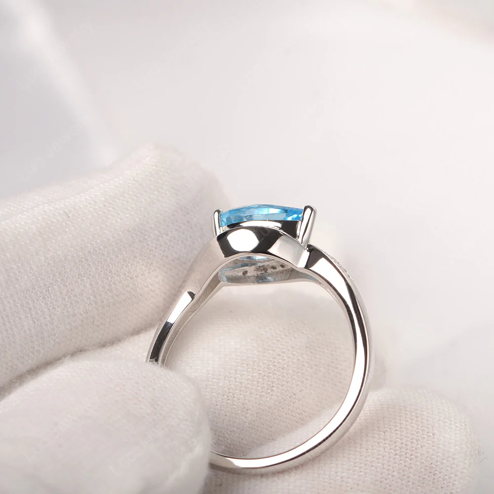 East West Pear Swiss Blue Topaz Engagement Ring - Image 4