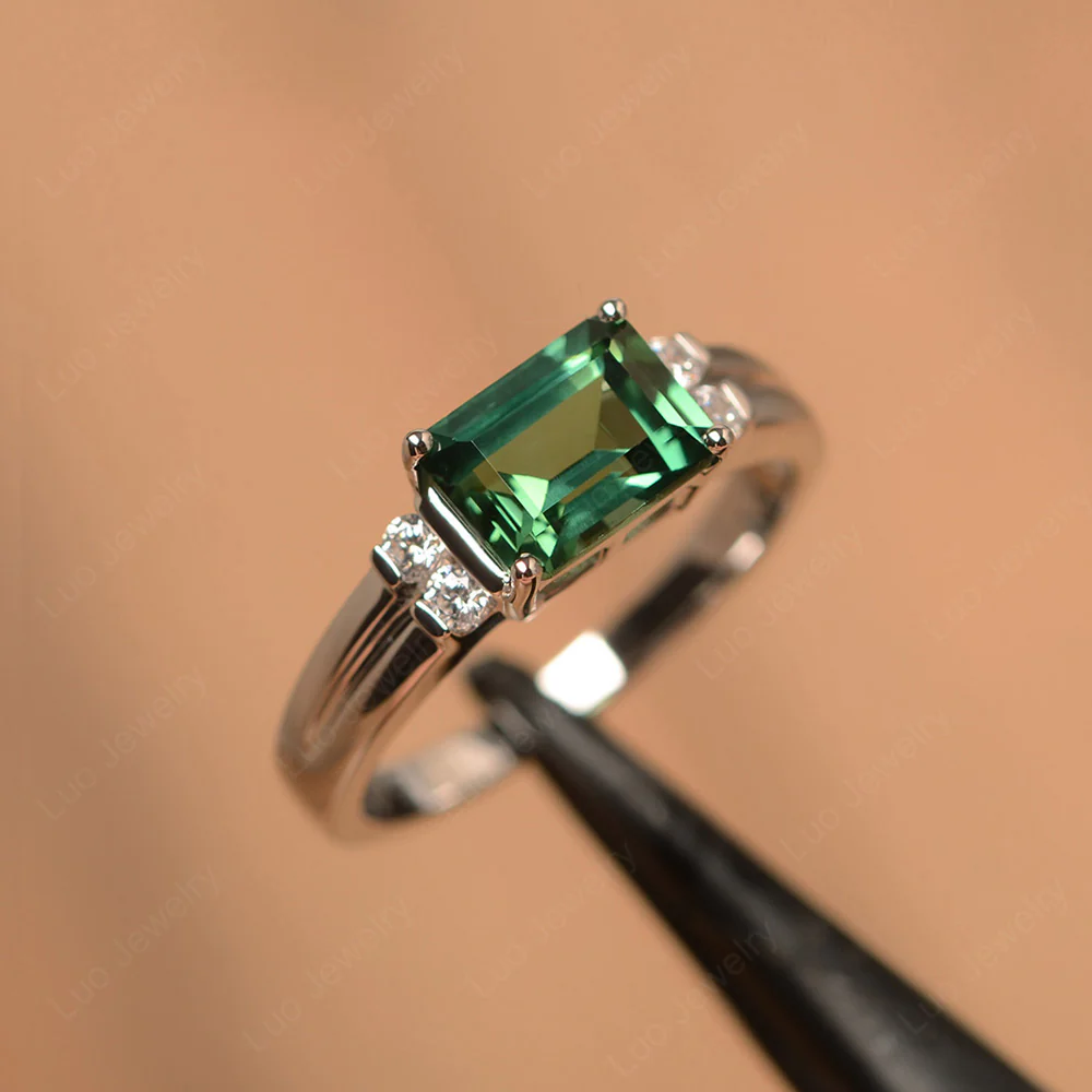 Emerald Cut East West Green Sapphire Ring - Image 2
