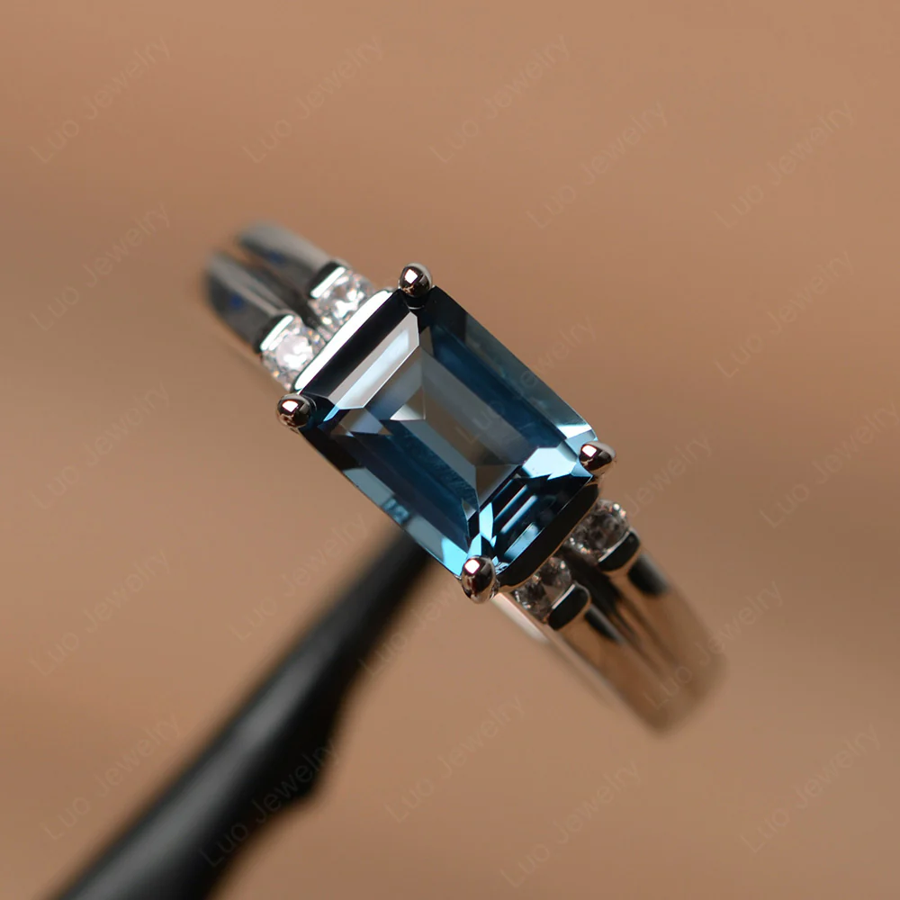 Emerald Cut East West London Blue Topaz Ring