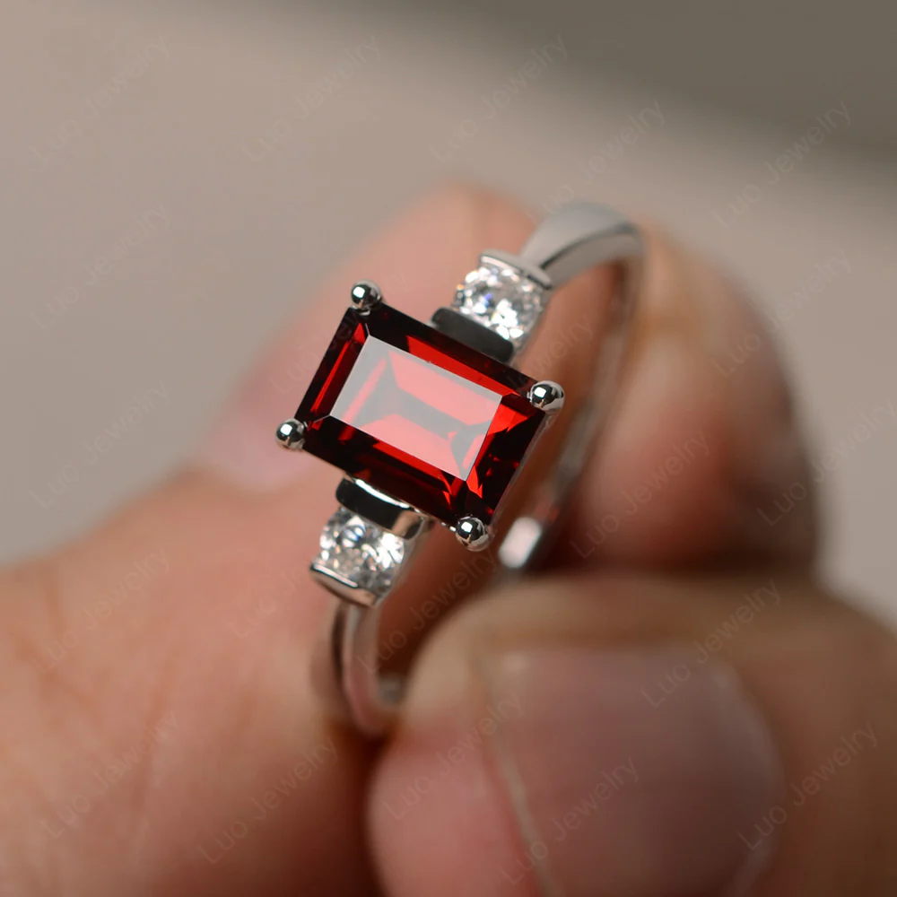 Emerald Cut Garnet Trilogy Ring