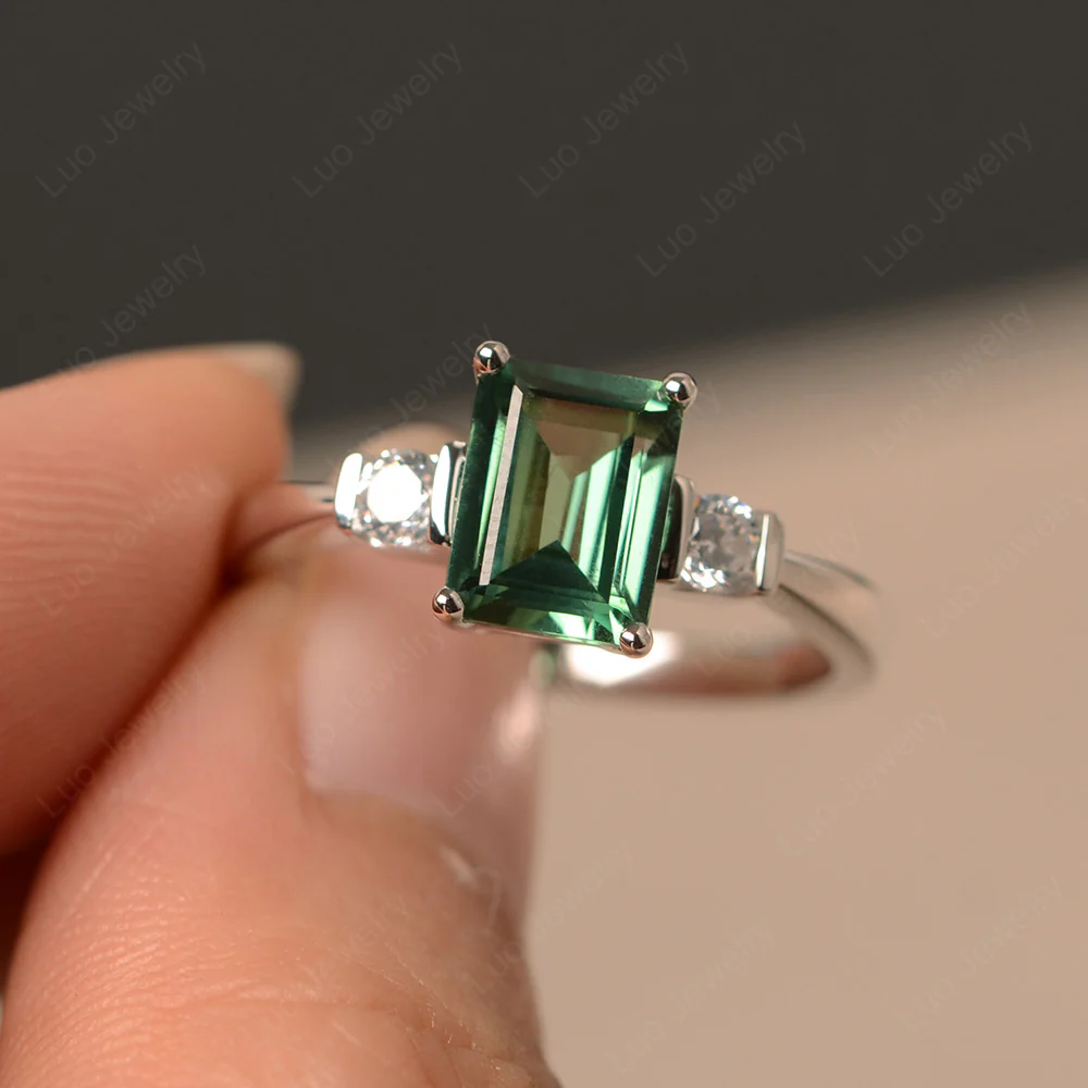 Emerald Cut Green Sapphire Trilogy Ring