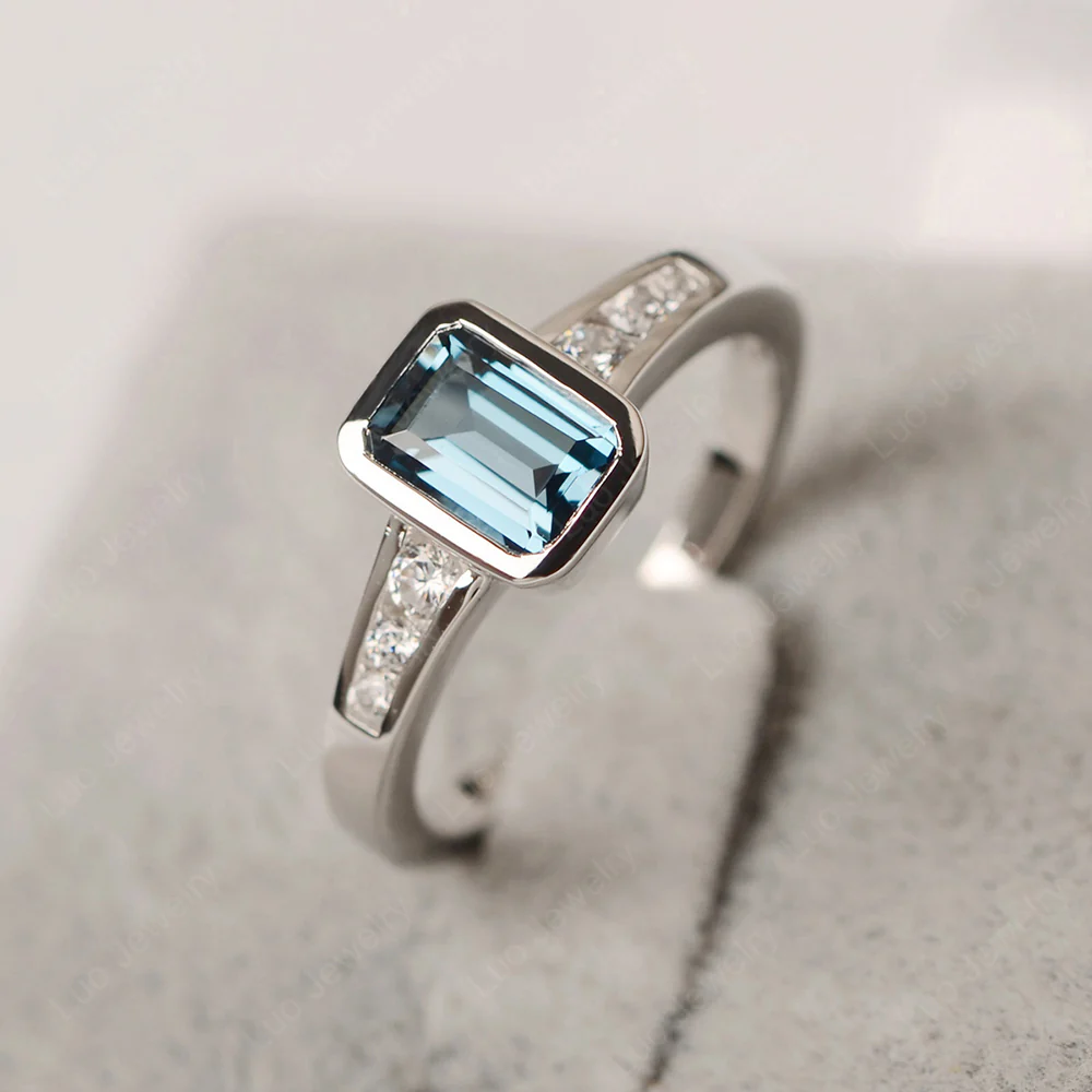 Emerald Cut London Blue Topaz Bezel Set Ring
