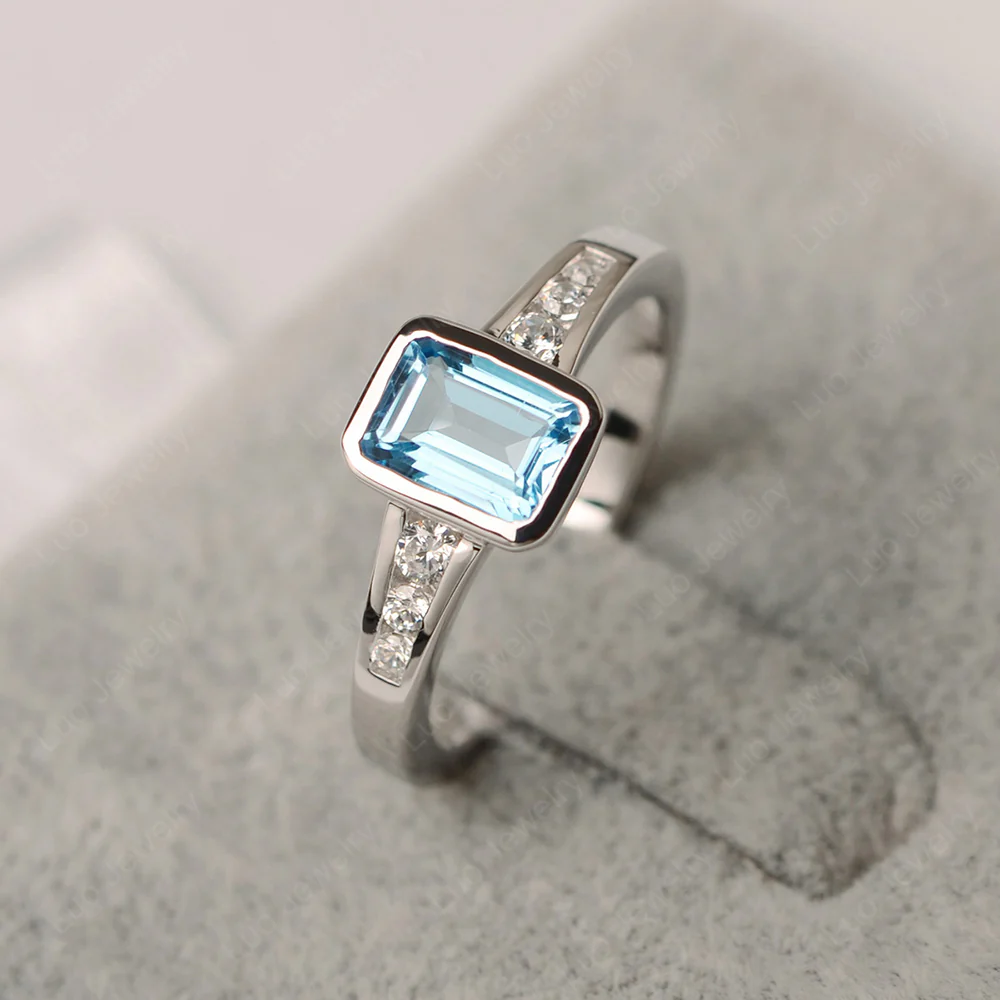 Swiss Blue Topaz Emerald Cut Bezel Ring