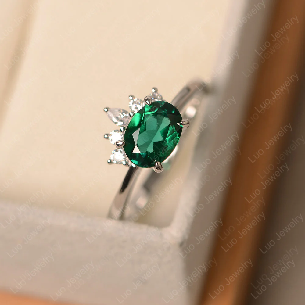 Half Sunburst Oval Emerald Ring