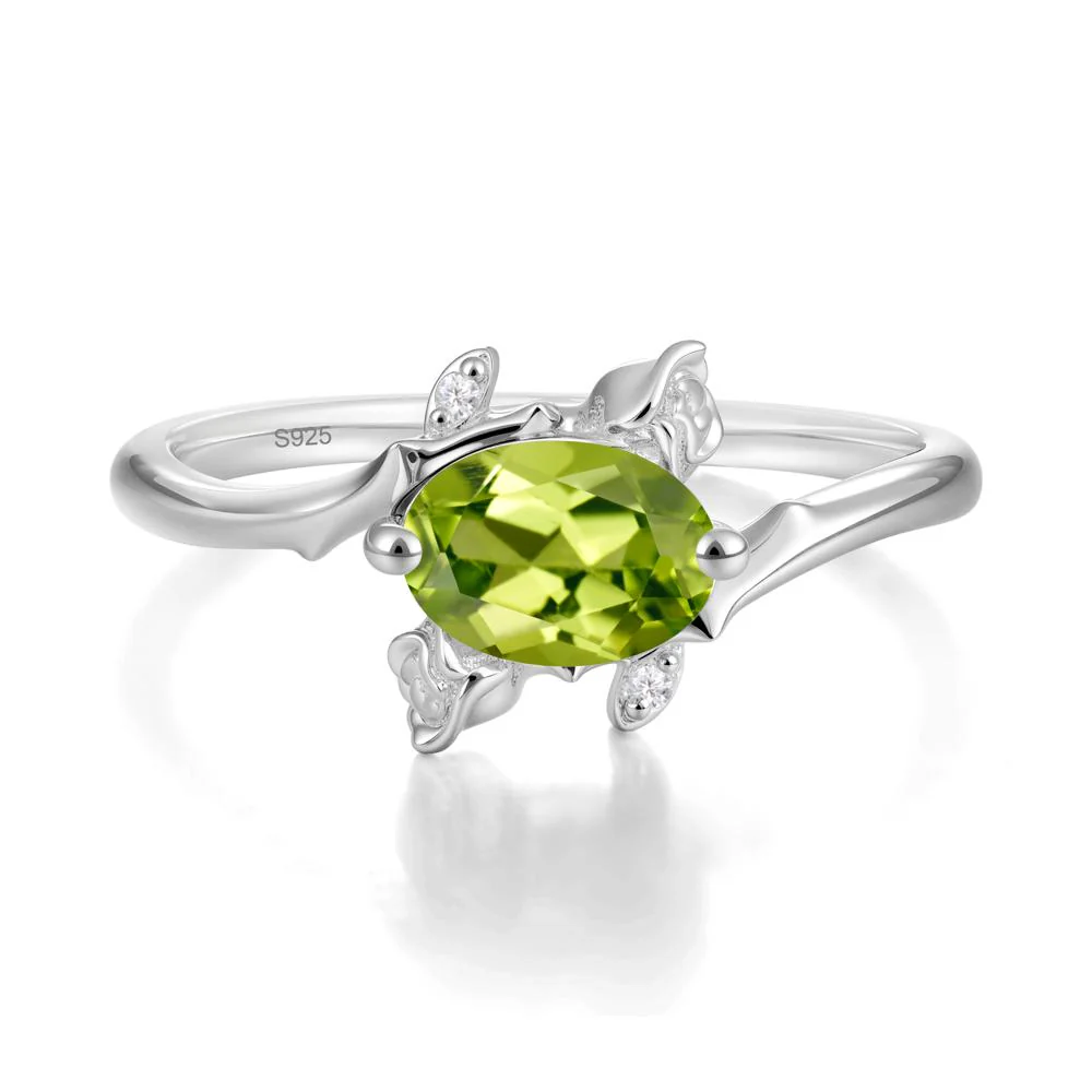 Floral Oval Cut Peridot Engagement Ring - Image 9