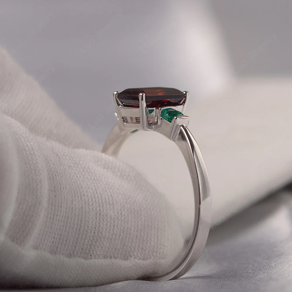 Emerald Cut Garnet and Emerald Trilogy Ring - Image 4
