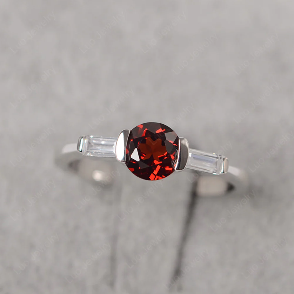 Garnet Ring Round Cut with Baguette Side