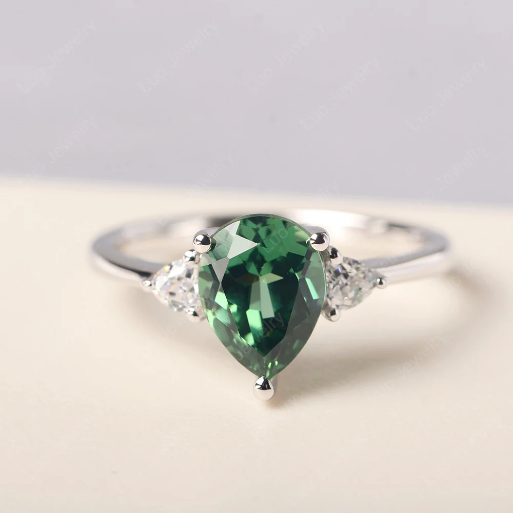 Teardrop Green Sapphire Trilogy Ring