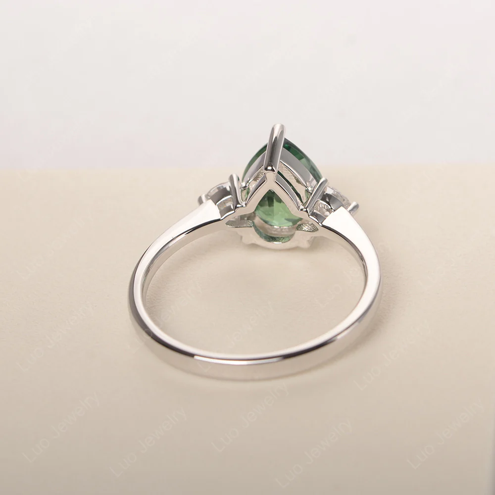 Teardrop Green Sapphire Trilogy Ring - Image 3